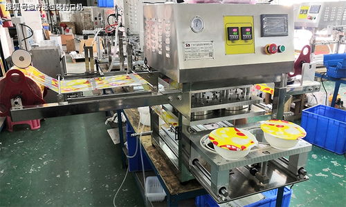 锁鲜装与环保塑料碗自动封膜机 高效、安全、智能的包装解决方案